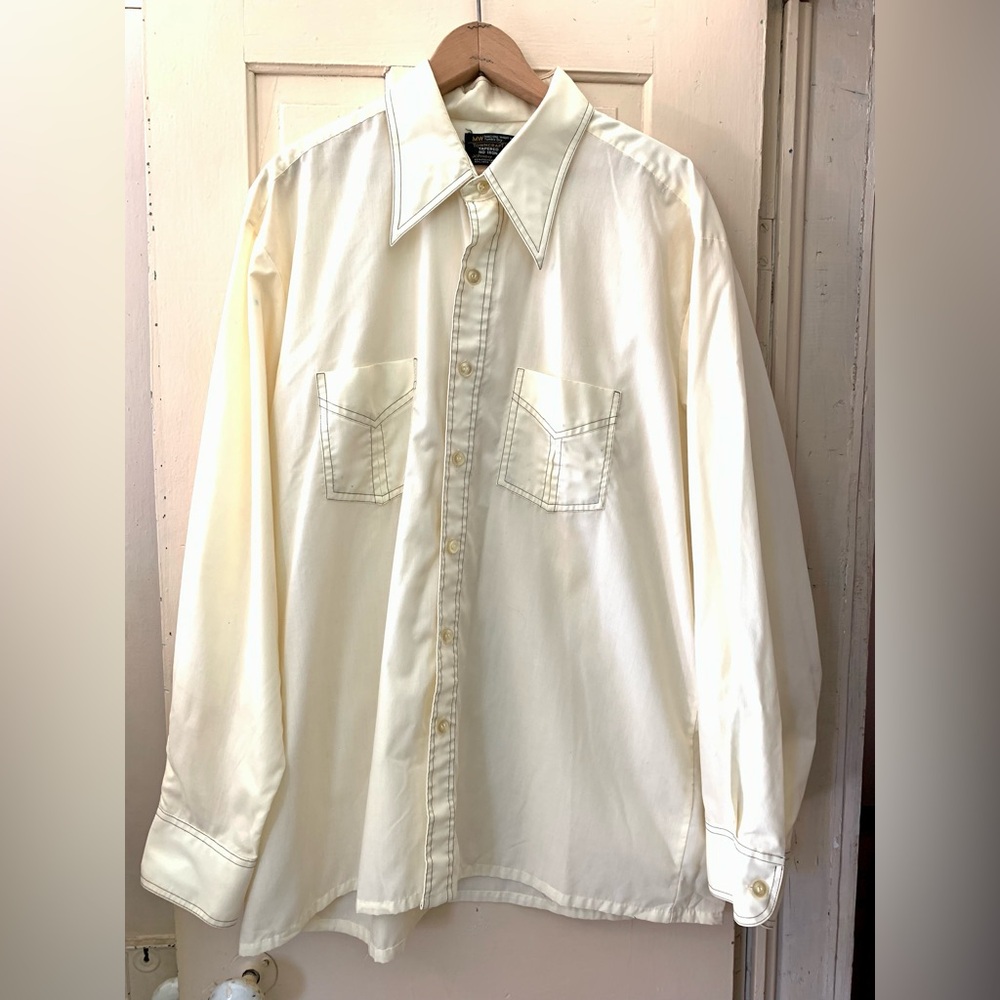 Vintage 1970s button down top with brown stitch detailing.